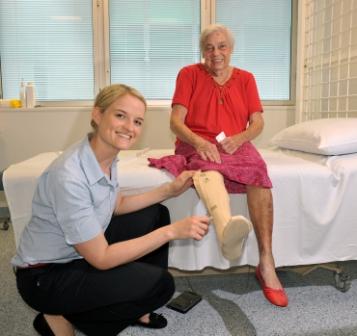 Mavis Gough has her wound checked by Belinda Long