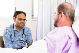 Doctor with patient in hospital