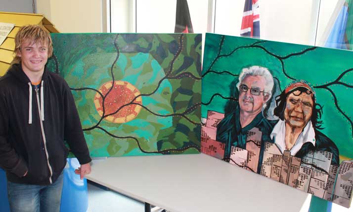 Teenager with indigenous artwork