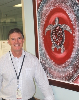 HADS Nurse Unit Manager Ron McDonald with one of the artworks