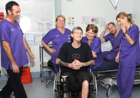 Patient Matthew Tarrant celebrates with Hyperbaric Medicine Service staff at the RBWH.
