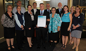 Caboolture Hospital's Executive Director Dr Lance Le Ray with representatives from nine local organisations.