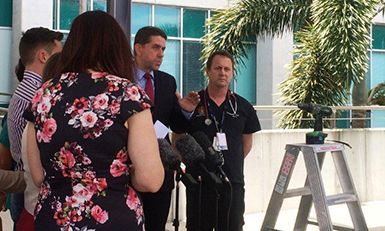 Health Minister Cameron Dick and RBWH Emergency Department specialist Dr Bill Lukin address media at the launch of the Don't Meet Us by Accident Christmas campaign.